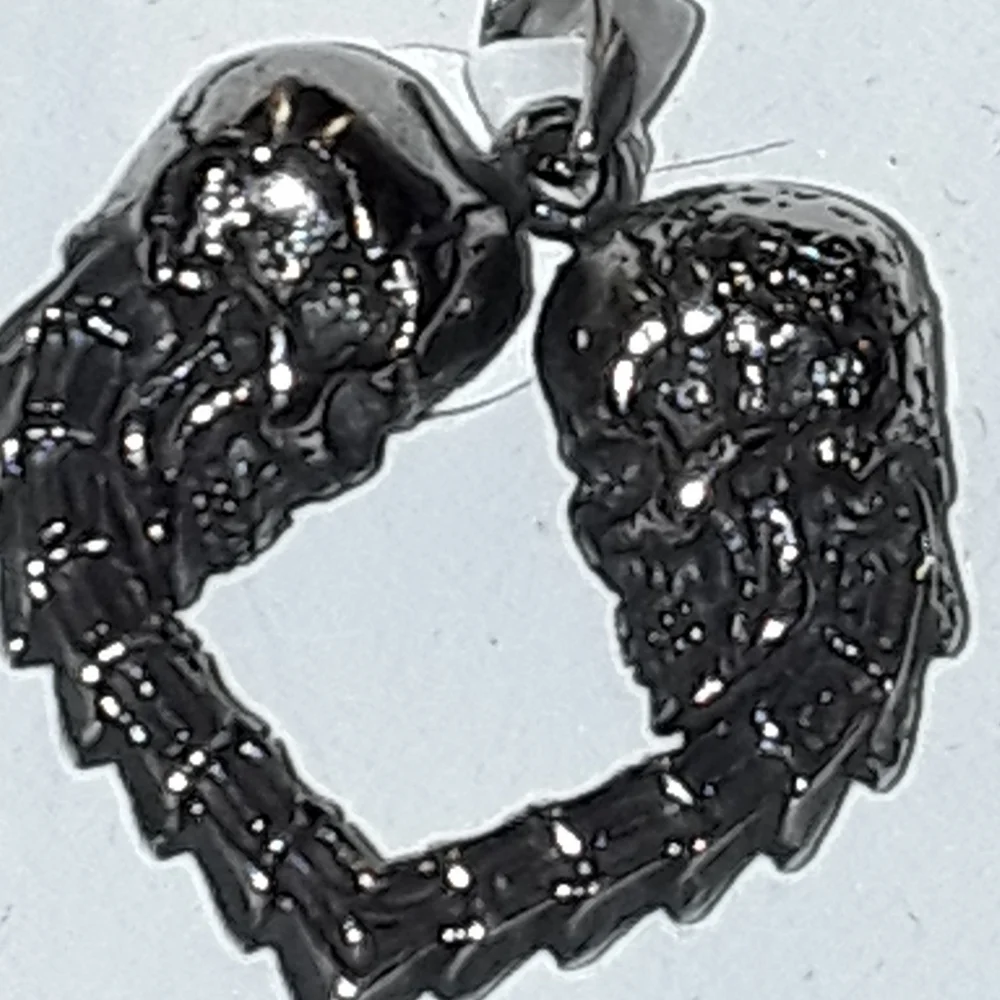 SKULL LOVE PENDANT IN STAINLESS STEEL